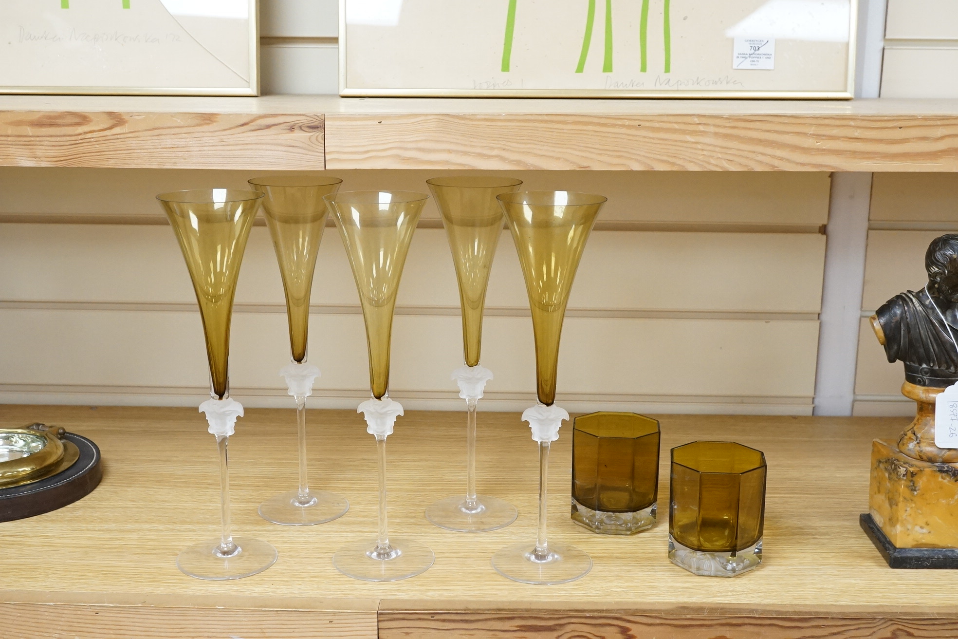Five Versace Medusa Lumiere green champagne flutes and two similar tumblers, flutes 30cm high